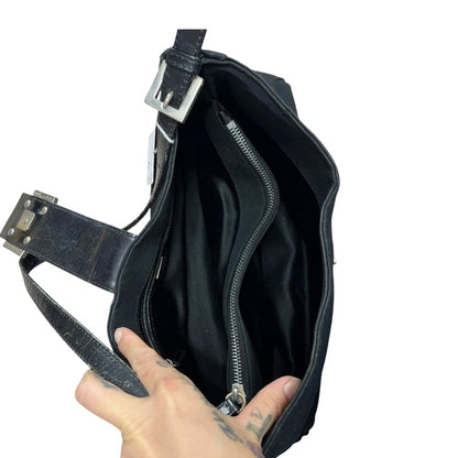 FENDI Nylon Canvas Baguette (though the shape is more of a hobo/shoulder bag, the buckle is iconic Fendi, often associated with Baguette styles) Shoulder Bag Black Silver Hardware Fe387